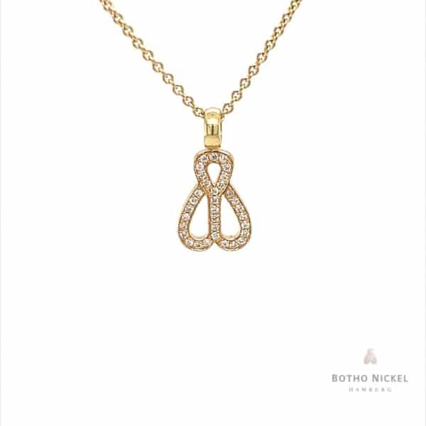 Kette aus 18 Karat Gelbgold mit Botho Nickel Fliege mit Brillanten im Verschnitt, Botho Nickel Schmuck Hamburg Juwelier und Goldschmiede