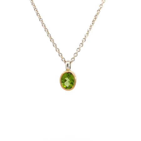 Kette aus Silber mit Peridot, Fassung aus 18 Karat Gold, Botho Nickel Schmuck Hamburg Juwelier und Goldschmiede